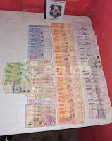 Allanamientos en San Martín de los Andes: dos demorados y secuestro de armas, dinero y drogas